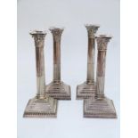 Set of four Mappin & Webb Prince's Plate silver plated Corinthian column candlesticks, height 28.5cm