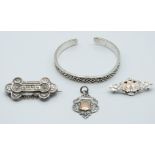 A silver bangle, Victorian brooch (Birmingham 1898), silver sweetheart brooch (Glasgow 1938) and a