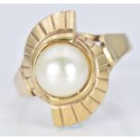 A 9ct gold ring set with a pearl, 5.4g, size P