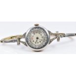 Victorian/ Edwardian 18ct gold ladies watch with platinum finish, set with diamonds around the