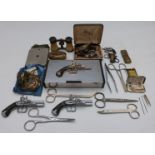 A quantity of small collectables including miniature pistols and revolvers, opera glasses, Joseph