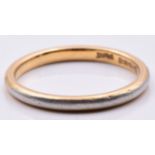 A 22ct gold wedding band/ ring with a platinum finish, 2.8g, size L