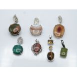 Seven silver pendants set with vesuvianite & zircon, agate, chrysocolla & diamond, agate & white