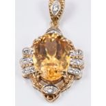 A 9ct gold pendant set with a large citrine and diamonds, 9.1g