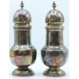 Art Deco pair of hallmarked silver sugar sifters or casters with pierced and knopped lids, raised on