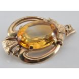 A 9ct gold pendant set with a citrine, 6.8g
