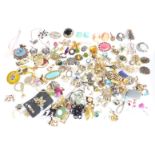 A collection of brooches and earrings including enamel and marcasite, Monet, Miracle, white metal,