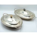 George III near pair of hallmarked silver covered oval serving dishes with ribbed rims and looped