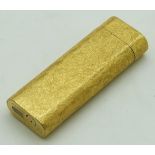 Cartier gold plated lighter with retro textured finish