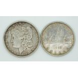 1881 Morgan USA one dollar together with a 1936 George V Canada dollar