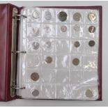 An amateur collection of UK and world coinage, George III onwards and some banknotes, in an album