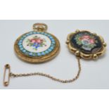 A Victorian brooch set with enamel and a Victorian pendant set with Bilston enamel and faux