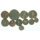 Eleven Roman bronze coinage pieces and pirate cobs