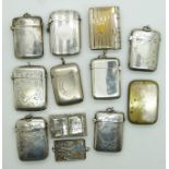 Ten silver plated vesta cases, small trinket box and a miniature souvenir book