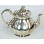 Victorian hallmarked silver teapot with lobed body and fruit finial, London 1843 maker John Eley,