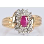 A 10k gold ring set with a ruby and diamonds, 3.5g, size T