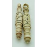 Two 19thC turned ivory Indian Madras ware stilettos, longest 6.5cm