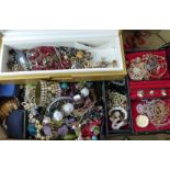 A collection of costume jewellery including silver earrings set with a cameo, silver necklace,