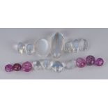 Eleven loose moonstone cabochons and six pink sapphire beads