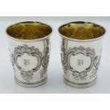 WITHDRAWN    Pair of Georgian hallmarked silver beakers with gilt wash interiors and embossed
