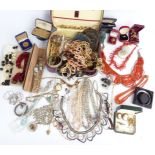 A collection of costume jewellery including vintage boxes, cameo brooches, diamanté, pearl necklace,