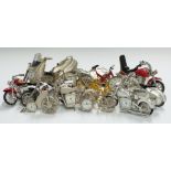 A collection of novelty miniature clocks relating to motorcycles and cycles
