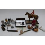 A horse and jockey table lighter, further lighters and pipes including Meerschaum and clay pipes