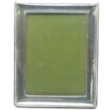 George V hallmarked silver oak easel backed photograph frame to suit 8 x 6 inch photo, Birmingham
