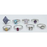 Eight silver rings set with ametrine, tanzanites, ruby, zircon, itinga petalite, lavender quartz,