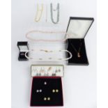 Two pearl necklaces, ivory necklace, glass necklaces and pearl earrings