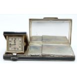 Art Deco hallmarked silver and black enamel compact and travelling clock, with travelling clock to