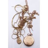 Three 9ct gold necklaces, a 9ct gold locket, Chester 1939, and 9ct gold St Christopher, 12.9g