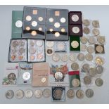 A collection of commemorative £5 coins and crowns, some UK proof sets etc