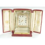 Cartier crystal cased clock with Roman ivory coloured dial, the eight hour keyless movement