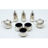 Elizabeth II hallmarked silver cruet set comprising three peppers, three open salts and two mustards