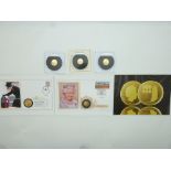 Two Tristan da Cunha 9ct gold coins, each 1g, together with a 22ct proof gold Royal Coat of Arms