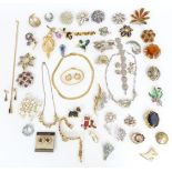 A collection of vintage brooches including diamante, marcasite, Exquisite etc