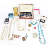 A collection of costumer jewellery including vintage brooches, silver cat brooch, silver necklace