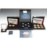 Nine Bradford Exchange WW1 commemorative gold plated coins with colour enhancement, housed in