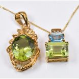 A 9ct pendant set with a peridot and a 9ct gold pendant set with a peridot, blue topaz and diamonds,