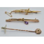 A 9ct gold brooch set with an amethyst, a 9ct gold brooch and a 9ct gold stick pin, 4.5g