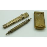 Avery Golden casket quadruple needle holder and two needle cases, longest 8cm