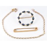 A 9ct gold brooch, 9ct gold bracelet and a 9ct gold brooch set with sapphires and diamonds (6.4g)