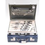 Berghaus stainless steel cutlery set in briefcase type case together with a similarly cased knife