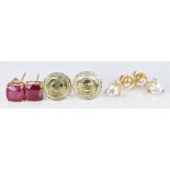 Three pairs of 9ct gold earrings set with rubellite, zircons and topaz