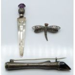 White metal brooch formed as an animal's leg set with a smoky quartz gem hoof, hallmarked silver