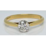 An 18ct gold ring set with a round cut diamond of approximately 0.4ct, 2.1g, size L