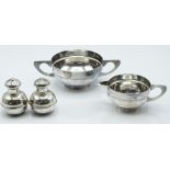 Pair of George V hallmarked silver peppers, London 1911 maker's marks indistinct, height 7cm, weight