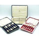 Two cased sets of hallmarked silver spoons, weight 115g together with an Asprey case and four