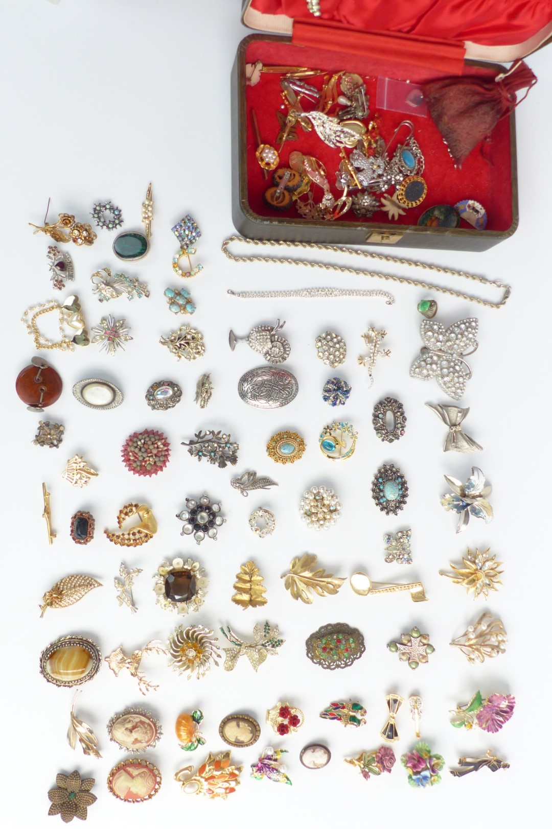 A collection of brooches including Miracle, Russian lacquer, Exquisite, Sphinx etc